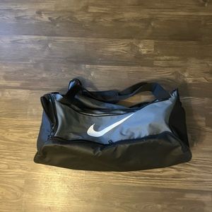 Large gray Nike duffle bag